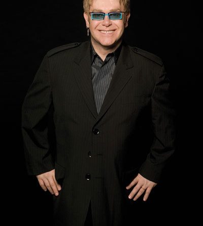 Elton John - Big Man In A Little Suit